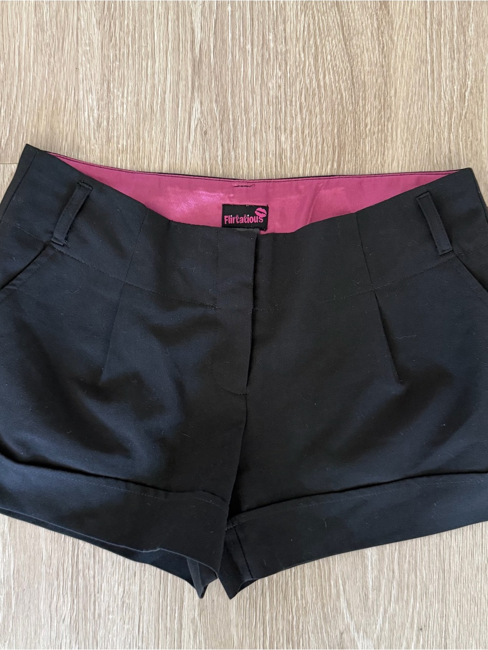 Flirtatious micro mini black Y2K shorts 9
